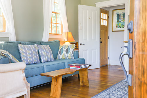 Seating area with a blue couch